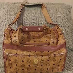 MCM Travel bag with luggage slot with storage bag.